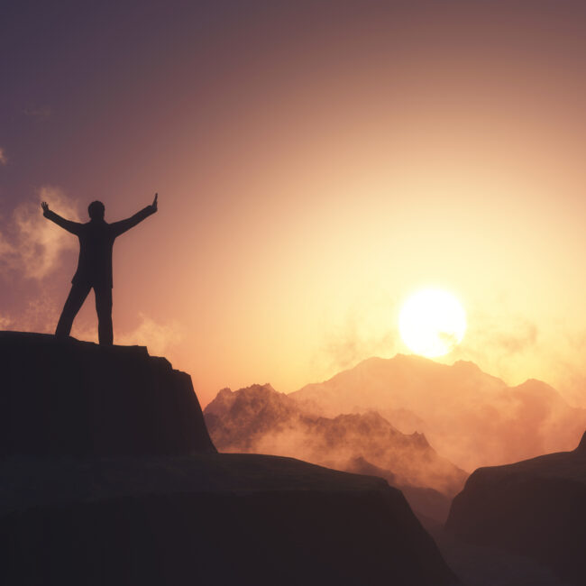 3d male figure with arms raised stood on mountain against sunset